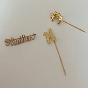 Gold Brooch Set.  You get all 3. The script pin may be gold filled.